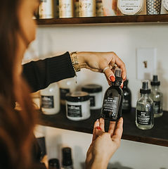 A variety of Davines hair care products displayed on a shelf at The Hair Lab in Calgary.