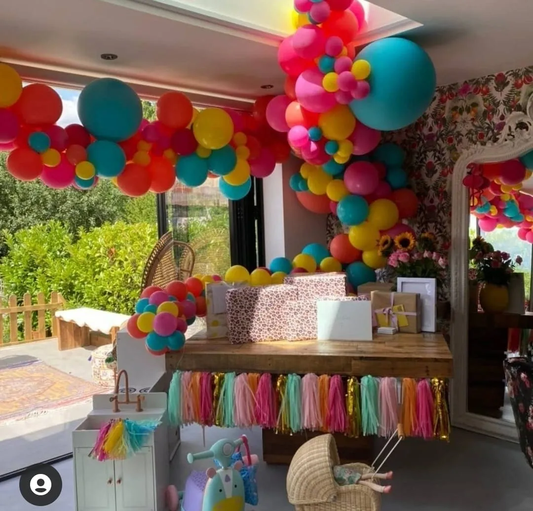 Lacey turner from east enders with her daughters dusty first birthday held at her radlett home rainbow theme large garland