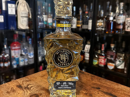 Bottle of Mi Familia Flores Reposado Tequila