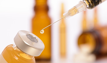 Syringe and vial closeup