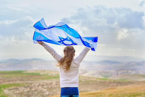 girl with israeli flag.jpeg