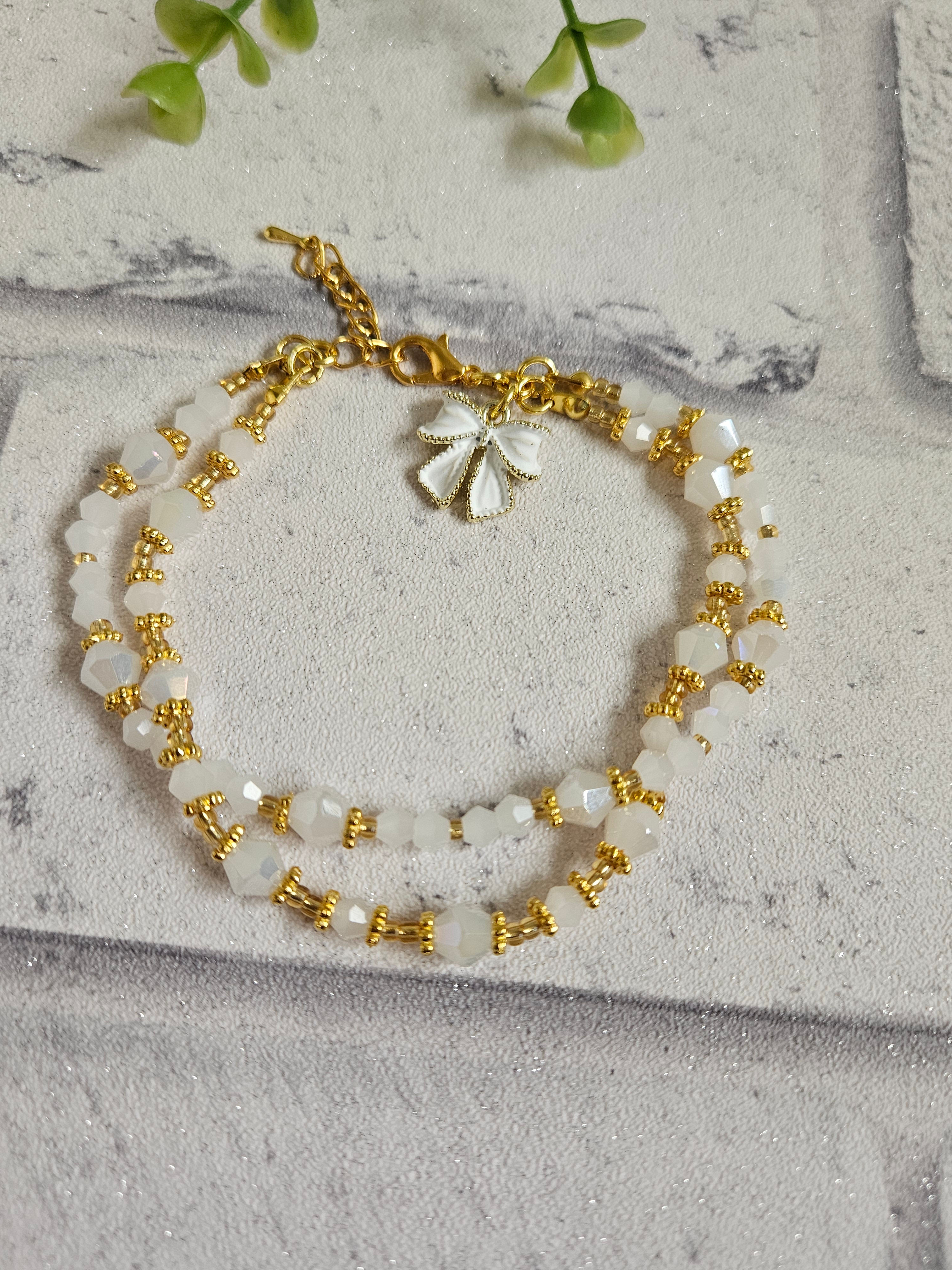 White and Gold Double Strand Beaded Bow Charm Bracelet