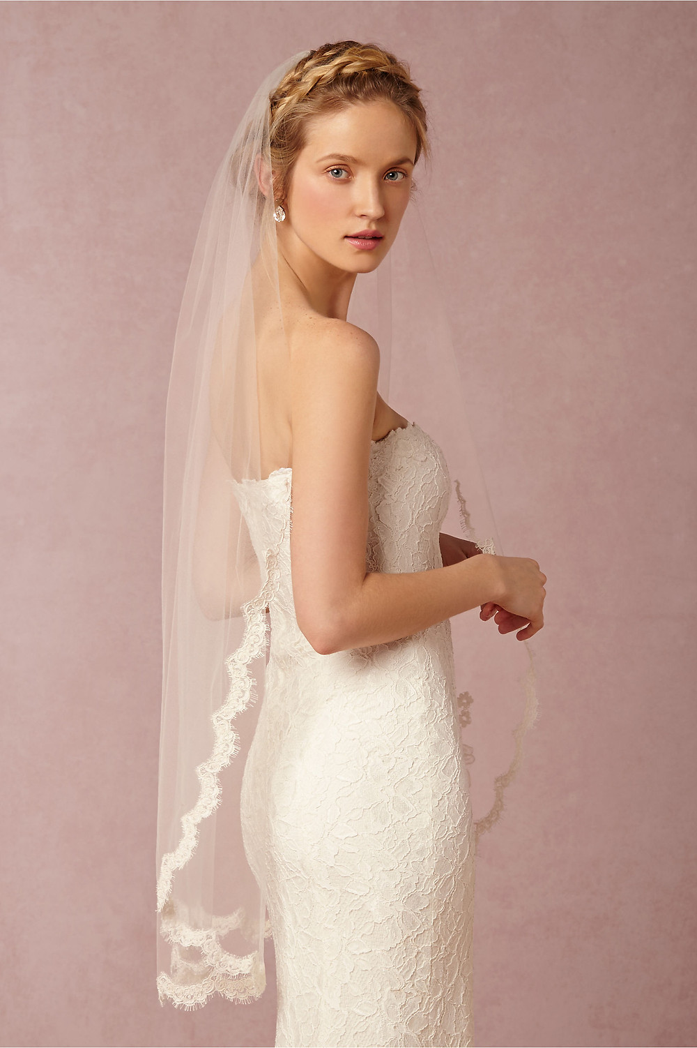 Bride wearing a fingertip veil
