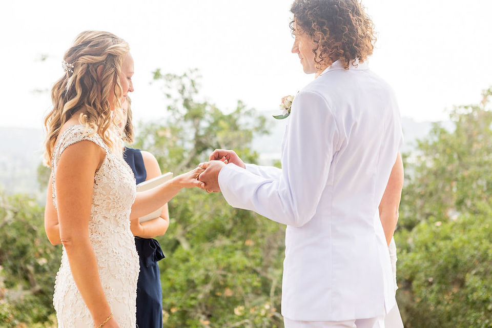 exchanging of rings Santa Barbara backyard wedding