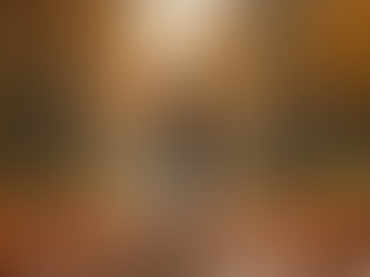 Woman walking through the woods in autumn.