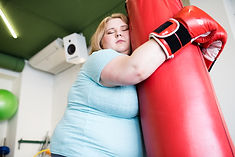 exhausted-obese-woman-in-workout-2021-09-24-04-02-49-utc.jpeg