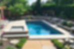 a new concrete pool installed into lanscaoed garden scene_edited_edited.jpg