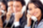 A woman engaged in a phone conversation regarding applied behavior analysis.