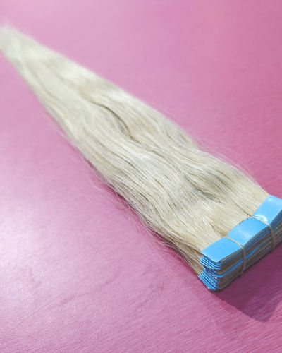 613 Blonde Straight Tape-In Extensions – Single-Donor Temple Hair