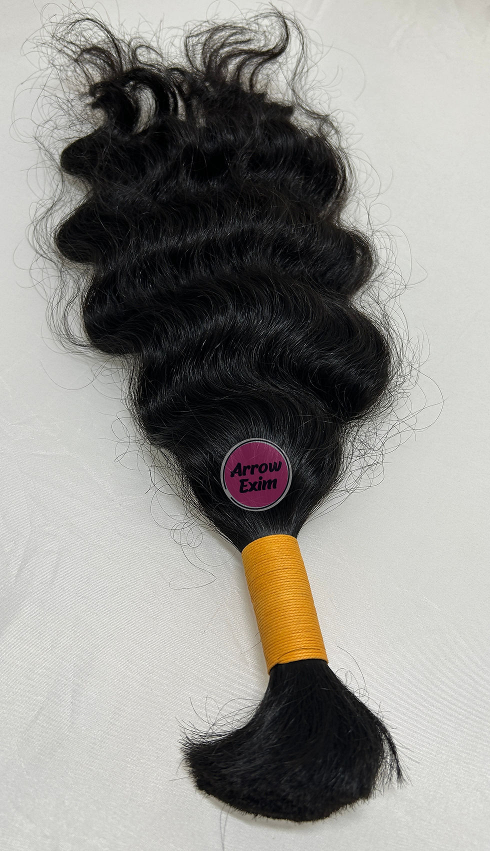 Eye-level view of hair extension bundles in various shades