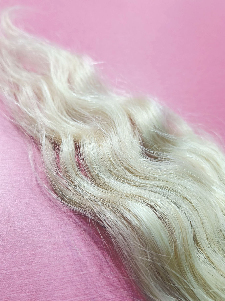 Wavy Blonde Tape in Hair Extensions