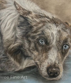 Realistic pastel portrait of a faithful dog resting on a blue blanket.