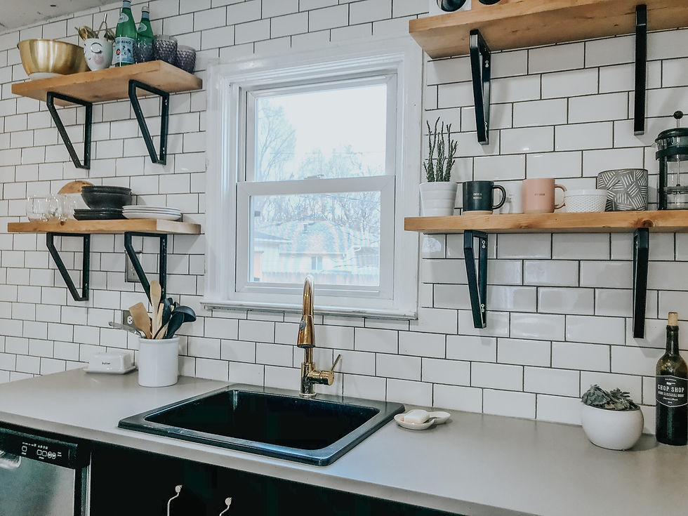 ikea kitchen with white subway tile and open shelving