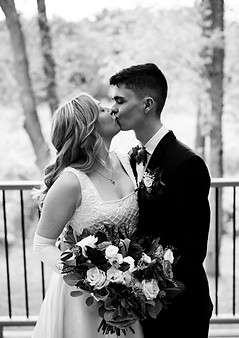 Bridal couples portrait after beautiful outdoor ceremony with Bride and Groom at First & Main Wedding and Event Venue in Sunfield Michigan by Grand Rapids and Lansing