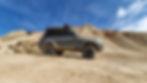 Dark grey land cruiser - desert.jpg