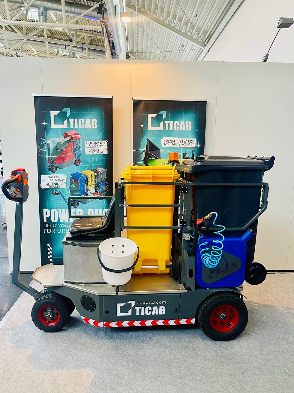 ride-on electric street barrow in the expo hall