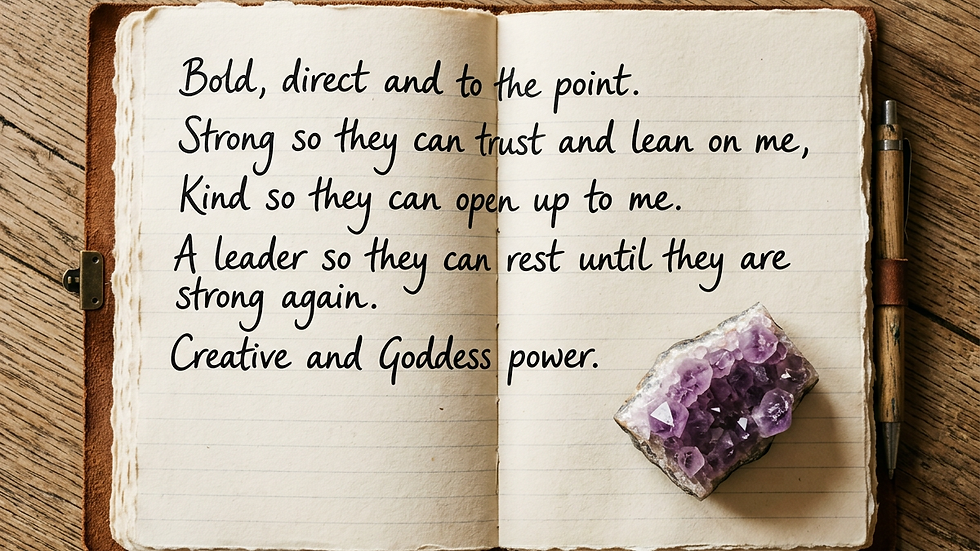 Close-up view of a journal with handwritten affirmations and a crystal on a wooden table
