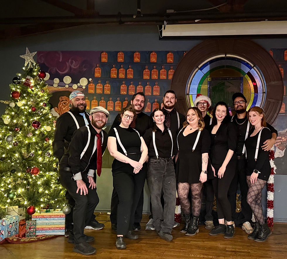 Group photos of Saints staff dressed to serve up a special event