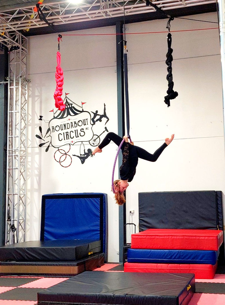Adult performing aerials at Roundabout Circus in Gosford