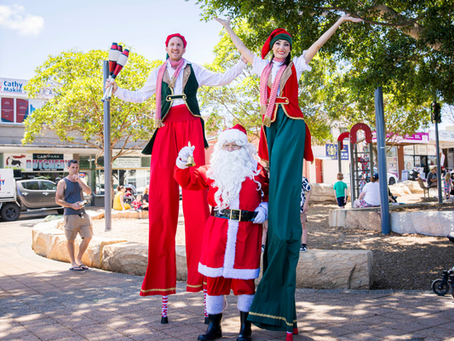 Roundabout Circus performers in Christmas themed outfits