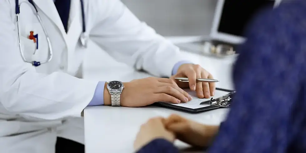doctor-and-young-woman-patient-talking-GettyImages-1477103143.webp