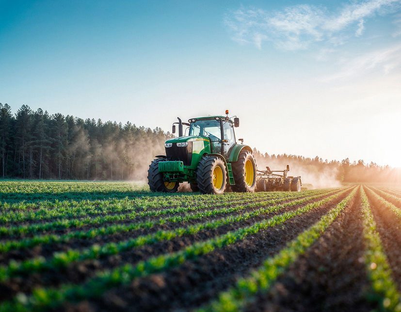 truck-working-field-sunny-day.jpg