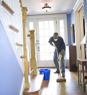 Man Cleaning Floor