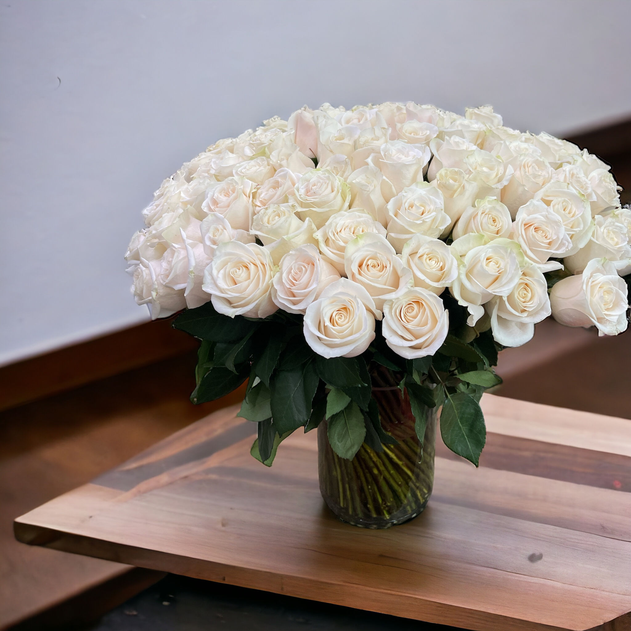 100 Beautiful Premium White Roses in a Glass Vase