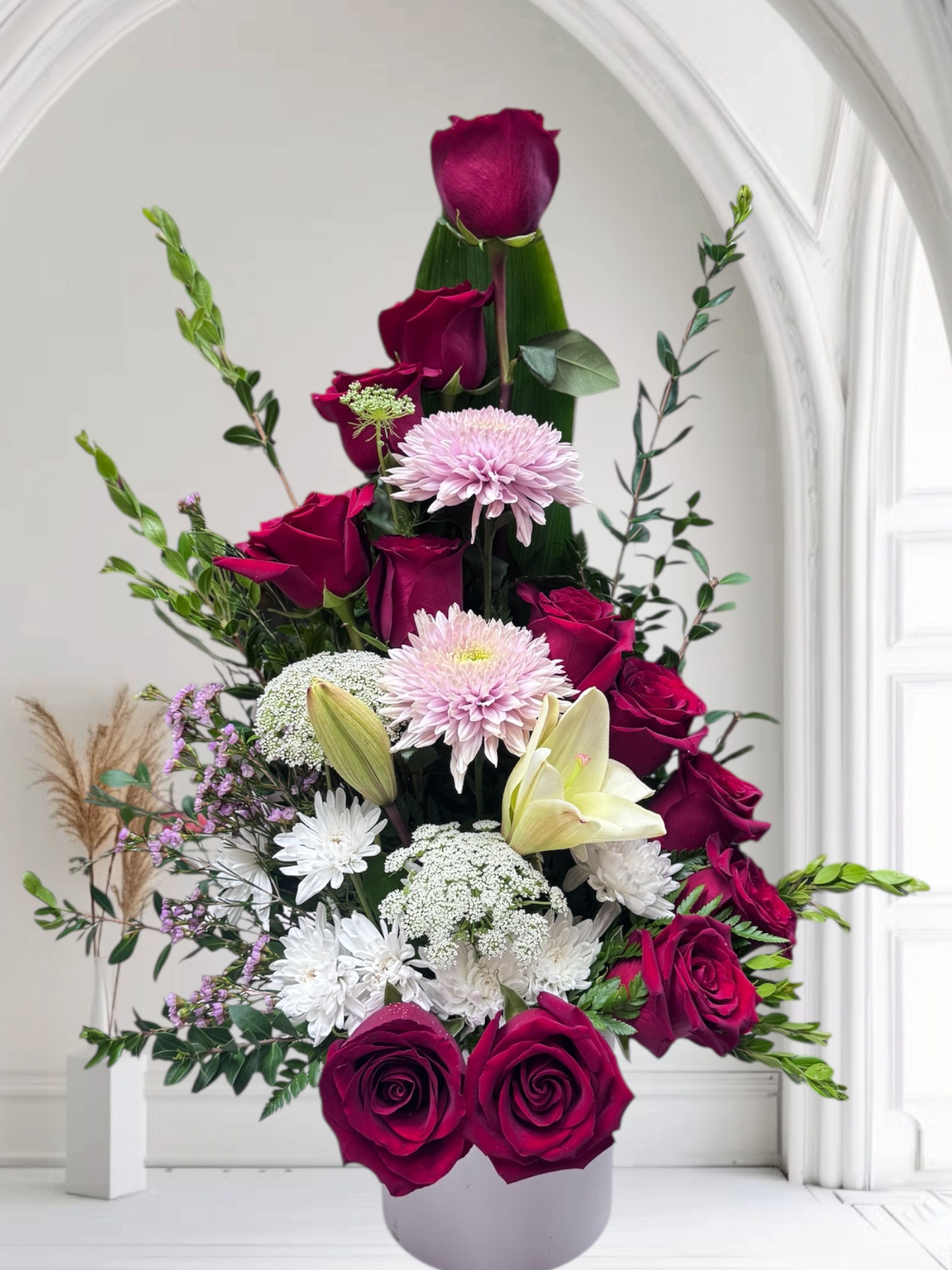 Beautiful Arrangement of red roses and flowers