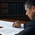 Lawyer working on a document depicting a lawyer working on family law