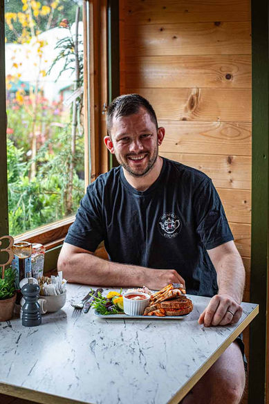 Avonfield Kitchen team member enjoying brunch in Trowbridge café