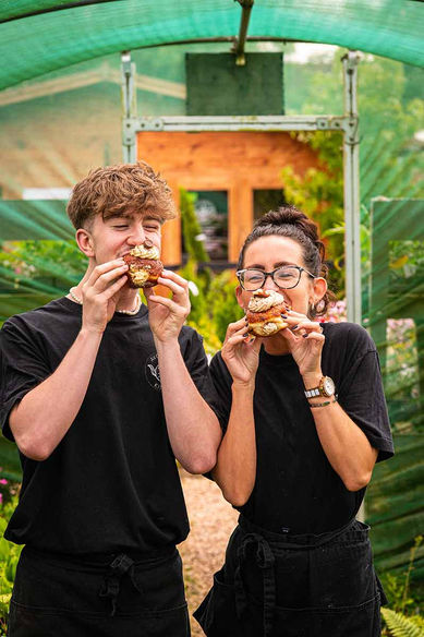 Staff sharing homemade cakes at Wiltshire café