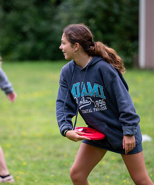 Campers playing Frisbee