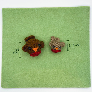 crochet robins birds on green felt