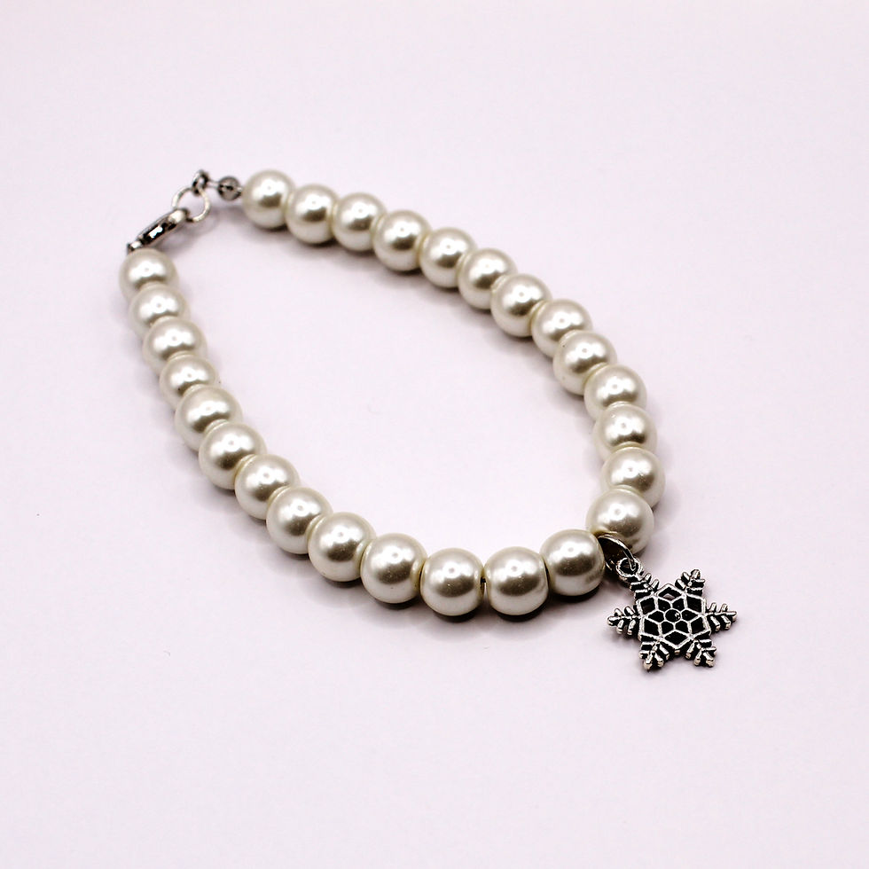Thumbnail: faux pearl bracelet with snowflake pendant on white background