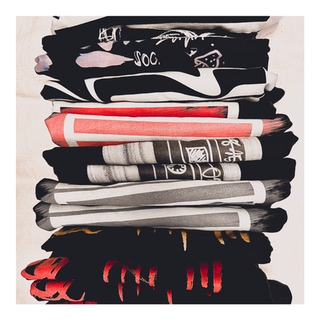 Stack of different 0815 SOCIETY Shirts