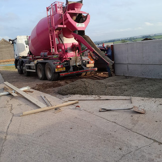 concrete lorry delivering concrete to the site for the concrete bay to be laid
