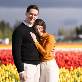 Couple embracing in a tulip field at the Skagit Tulip Festival