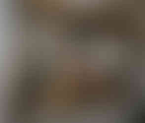 Bride getting makeup done, 'bride' text, reflected in rustic mirrors.