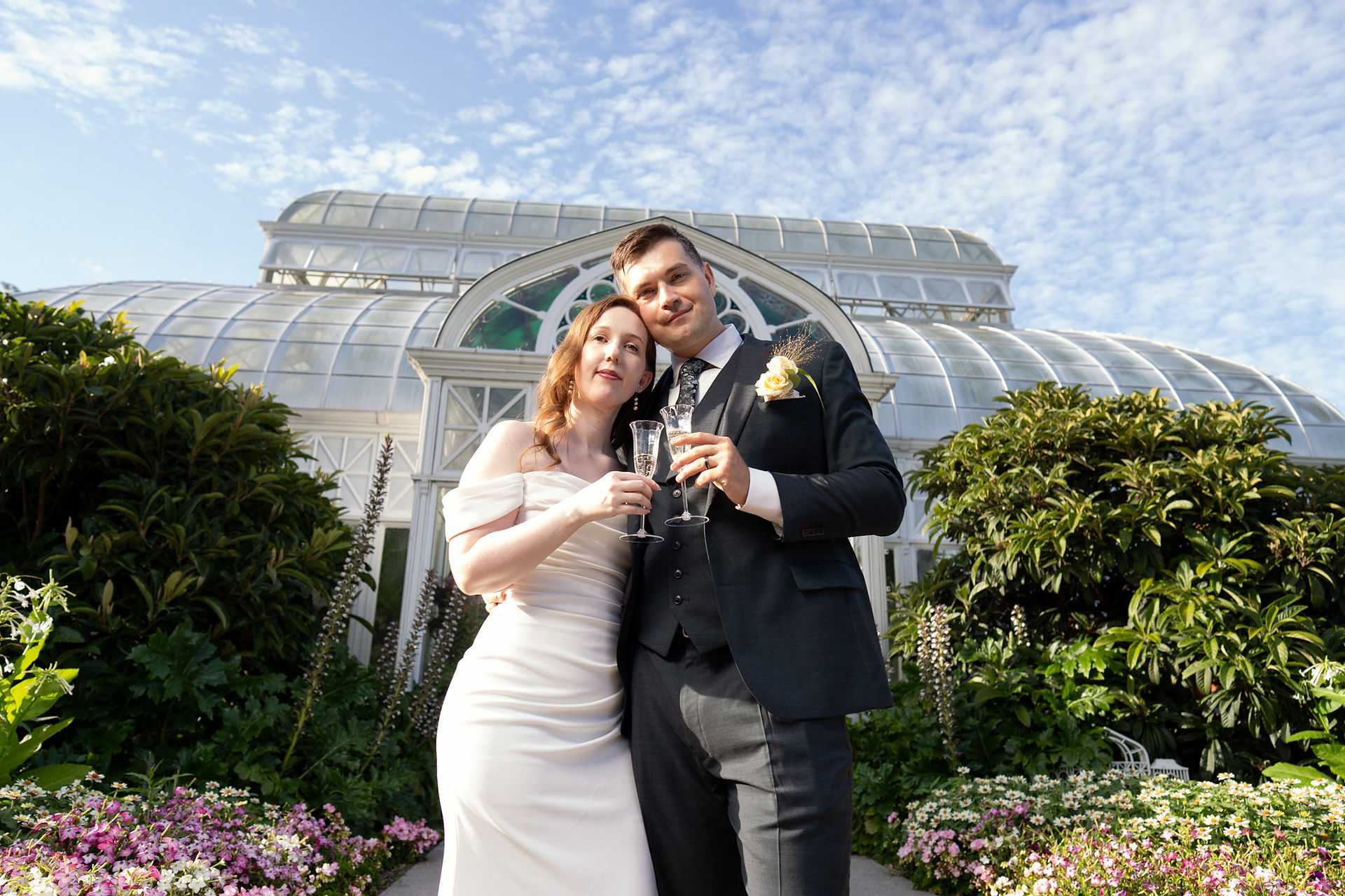 Couple toasting at Volunteer Park Conservatory in Seattle
