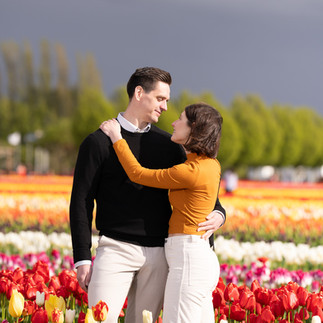 Couple embracing in tulip field at Skagit Tulip Festival