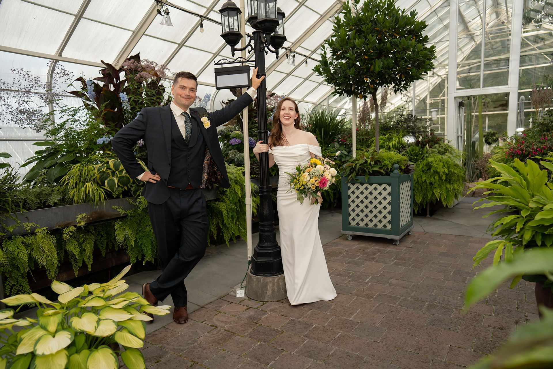 Wedding couple at Volunteer Park Conservatory in Seattle