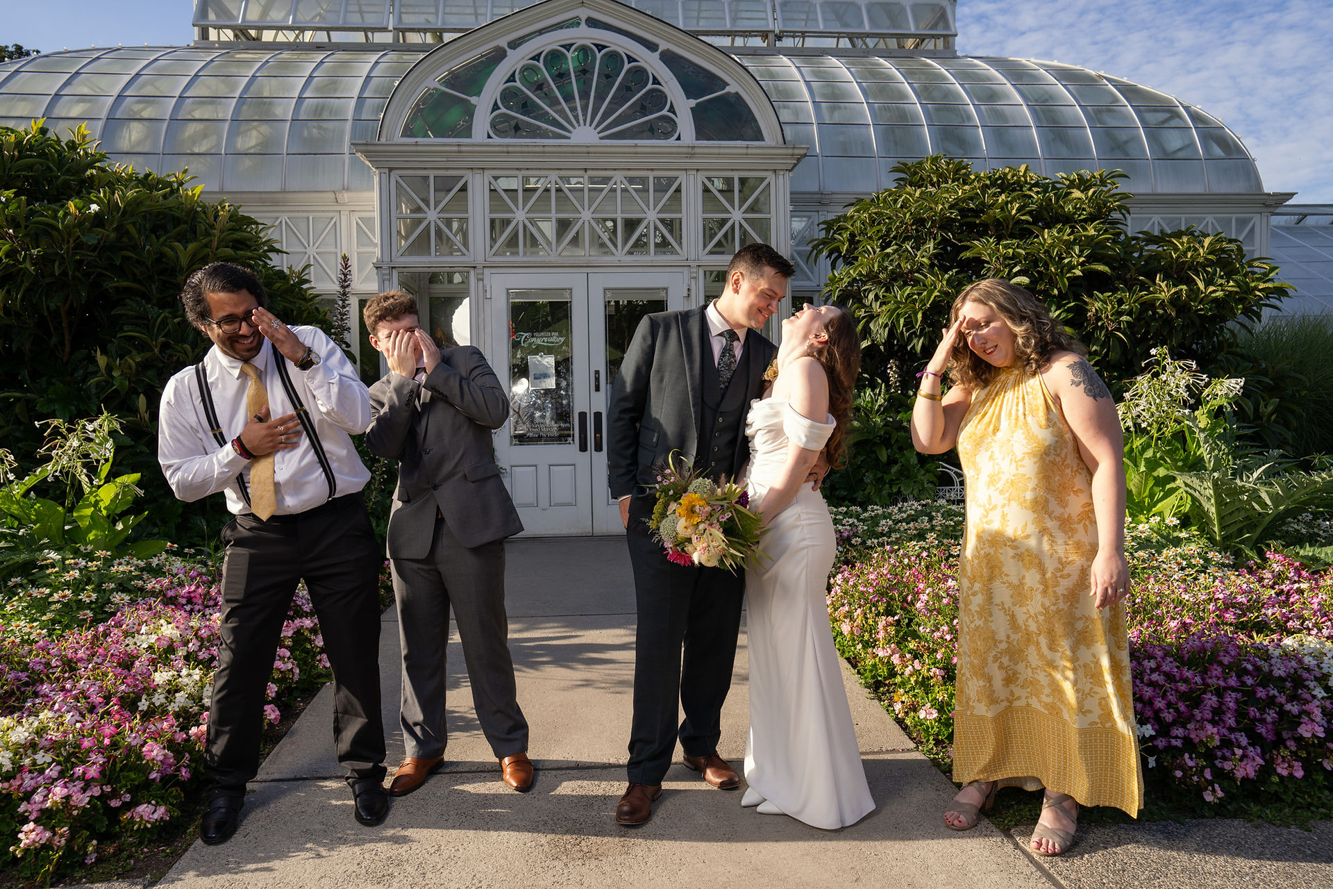 Wedding party at Volunteer Park Conservatory in Seattle.