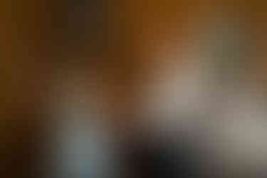 Man dancing with woman at wedding reception. "MARRIED MY BEST FRIEND" sign.