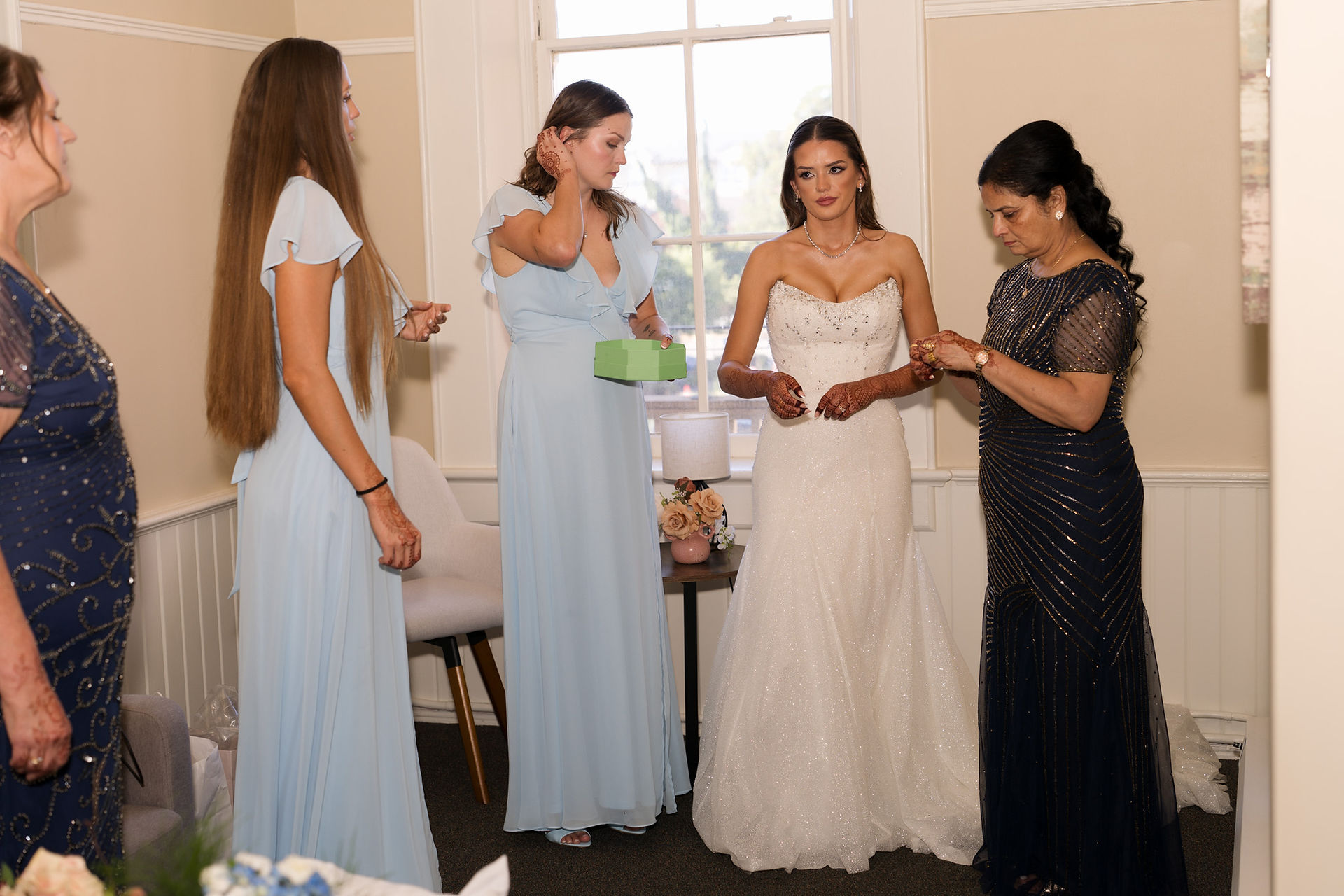 Bride getting ready with bridesmaids and WA Wedding Photographer