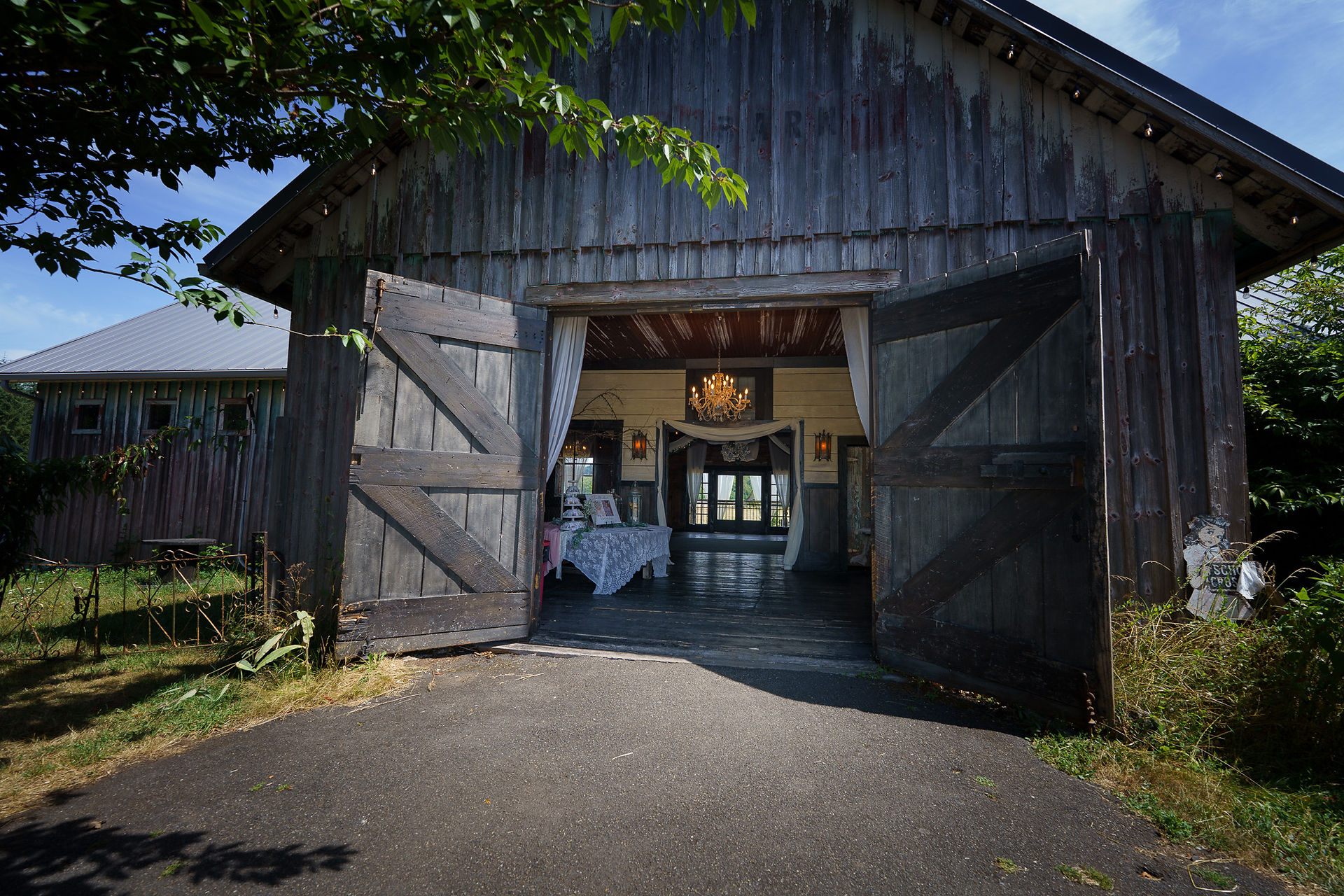Barn doors open to elegant wedding reception, The Barn on Jackson.