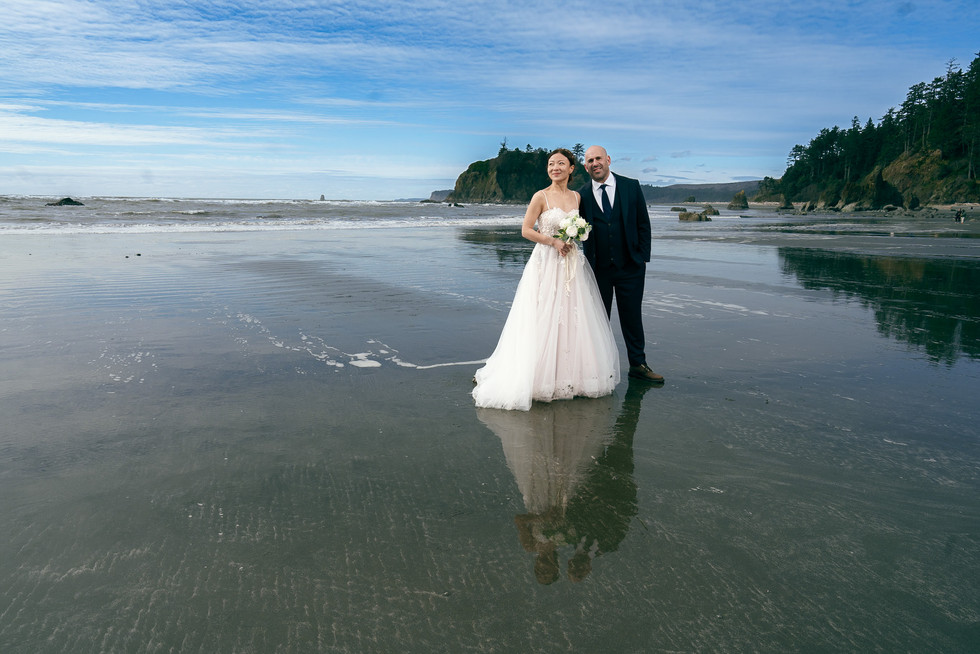 Couple on Ruby Beach for their Olympic National Park elopement.