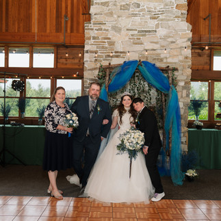 Wedding couple with family at Gold Mountain Golf Club
