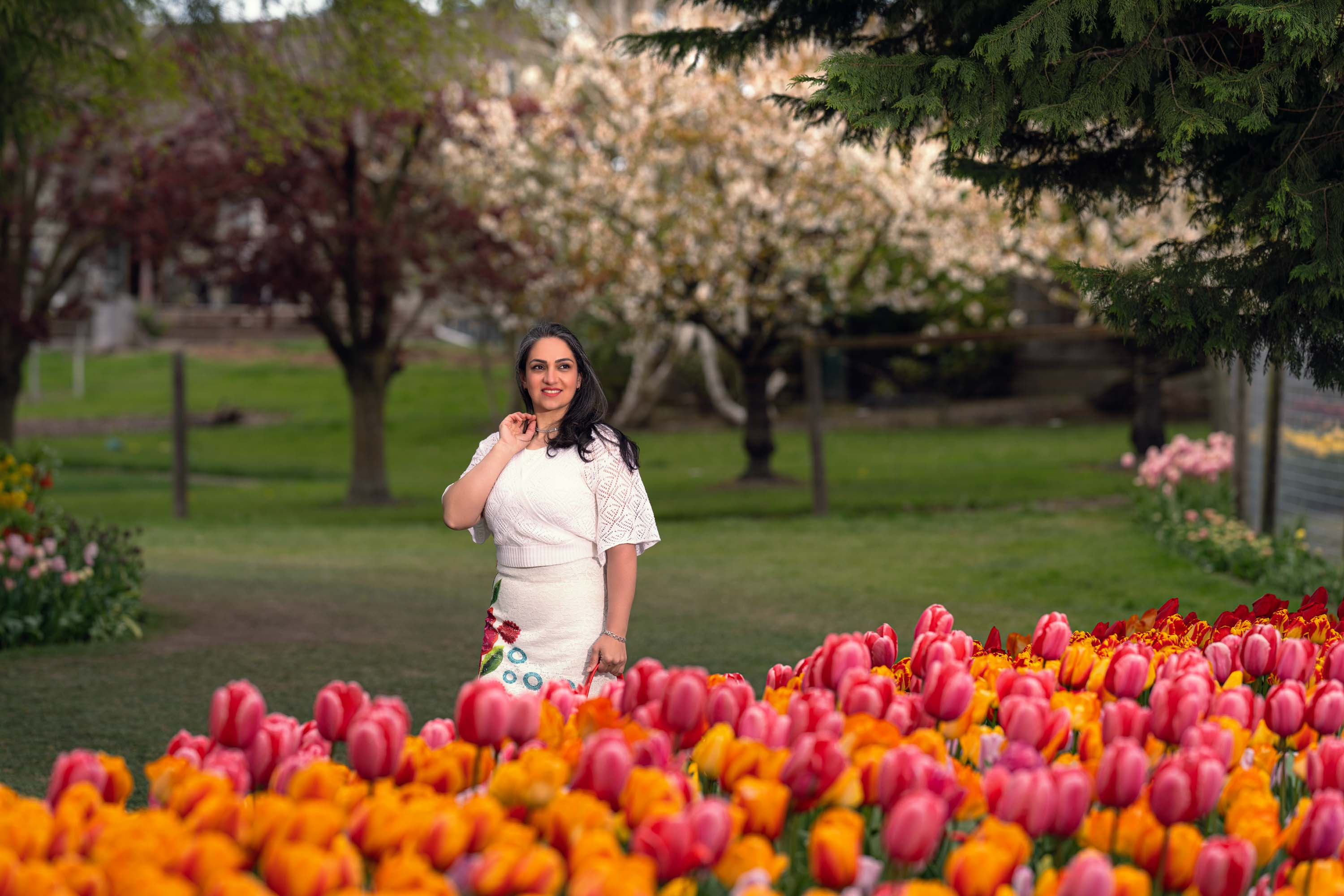 Woman smiling among tulips at Skagit Tulip Festival