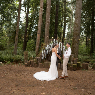 Bride and groom wedding ceremony at Forest Creek Darrington WA